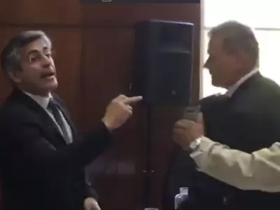 Romano-discutiendo-con-Ferrer