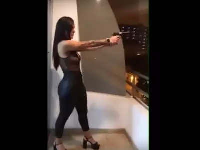 fany-c--disparo-balc�n-pistolera-mujer-arma-salta-fotos-video-