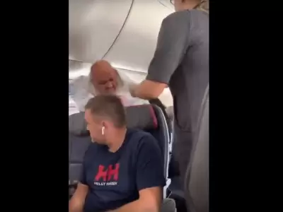 video-viral-vuelo-avi�n-mujer-celosa-golpe-hombre