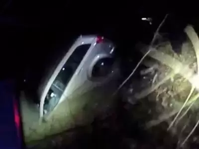 rescate-mujer-del-rio-policia
