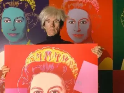 portrait-of-american-pop-artist-andy-warhol-as-he-holds-a-news-photo-1658403934-jpg.