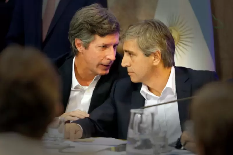 Luis Caputo y Santiago Bausili