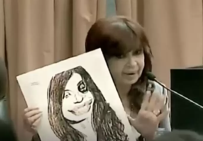 Cristina Fernndez mostr la caricatura que le hizo Sbat, al que acus de mafioso