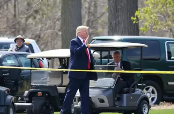 Donald Trump debi ser evacuado de un campo de golf.