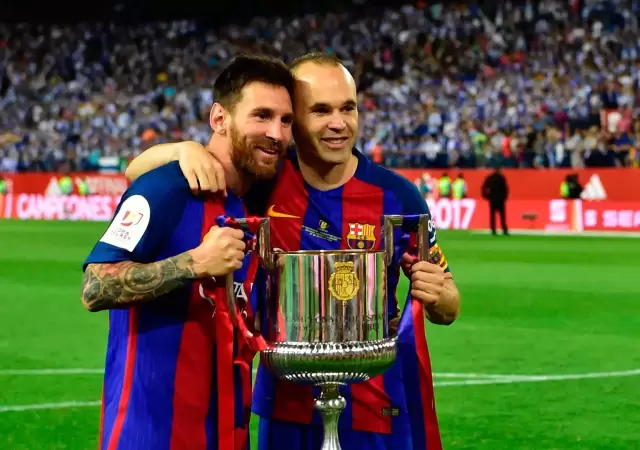 Leo Messi y Andrs Iniesta.