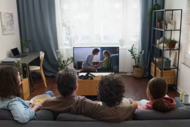 Una familia disfruta de una pel�cula