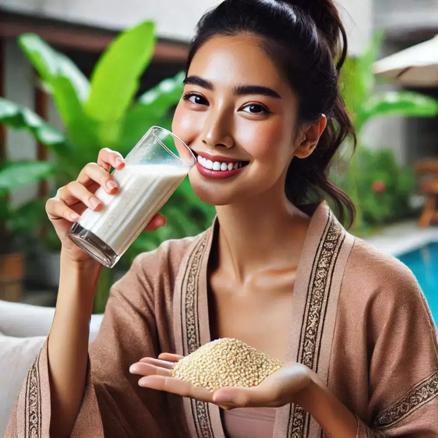 Mujer tomando leche de s�samo