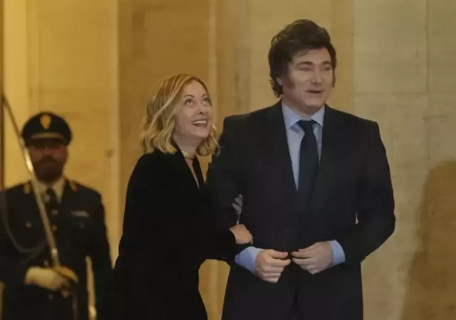 La jefa de Gobierno italiana y el mandatario argentino, en buena sinton�a. (Foto: web)