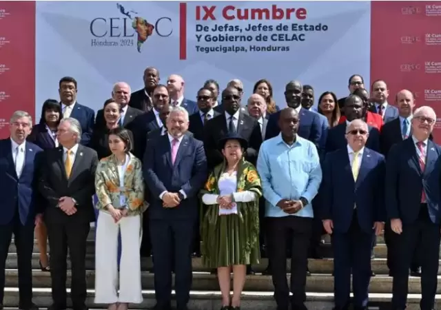Honduras le pasa la conducci�n de la CELAC a Colombia en un auditorio con muchas ausencias.