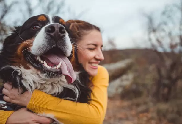 Perro y su dueña.