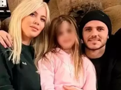 Francesca con sus padres.