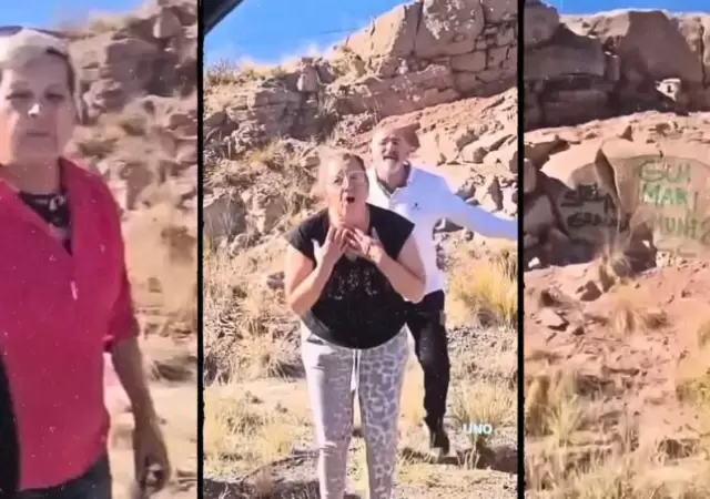 Momento en el que los turistas de Buenos Aires trataban de minimizar el hecho vand�lico mientras un joven los increp� por las inscripciones.