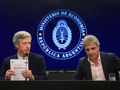 Santiago Bausili y Luis Caputo.