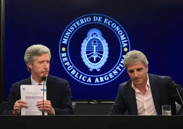 Santiago Bausili y Luis Caputo.