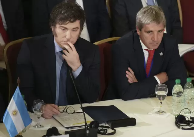 Javier Milei y Luis Toto Caputo