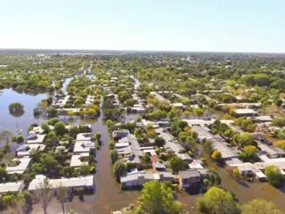 San Luis del Palmar sufre una de las peores inundaciones.