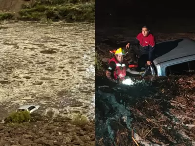Rescate: Tres motociclistas que realizaban pr�cticas en el Dique Fr�as quedaron atrapados cuando una repentina crecida por la tormenta los alcanz�.